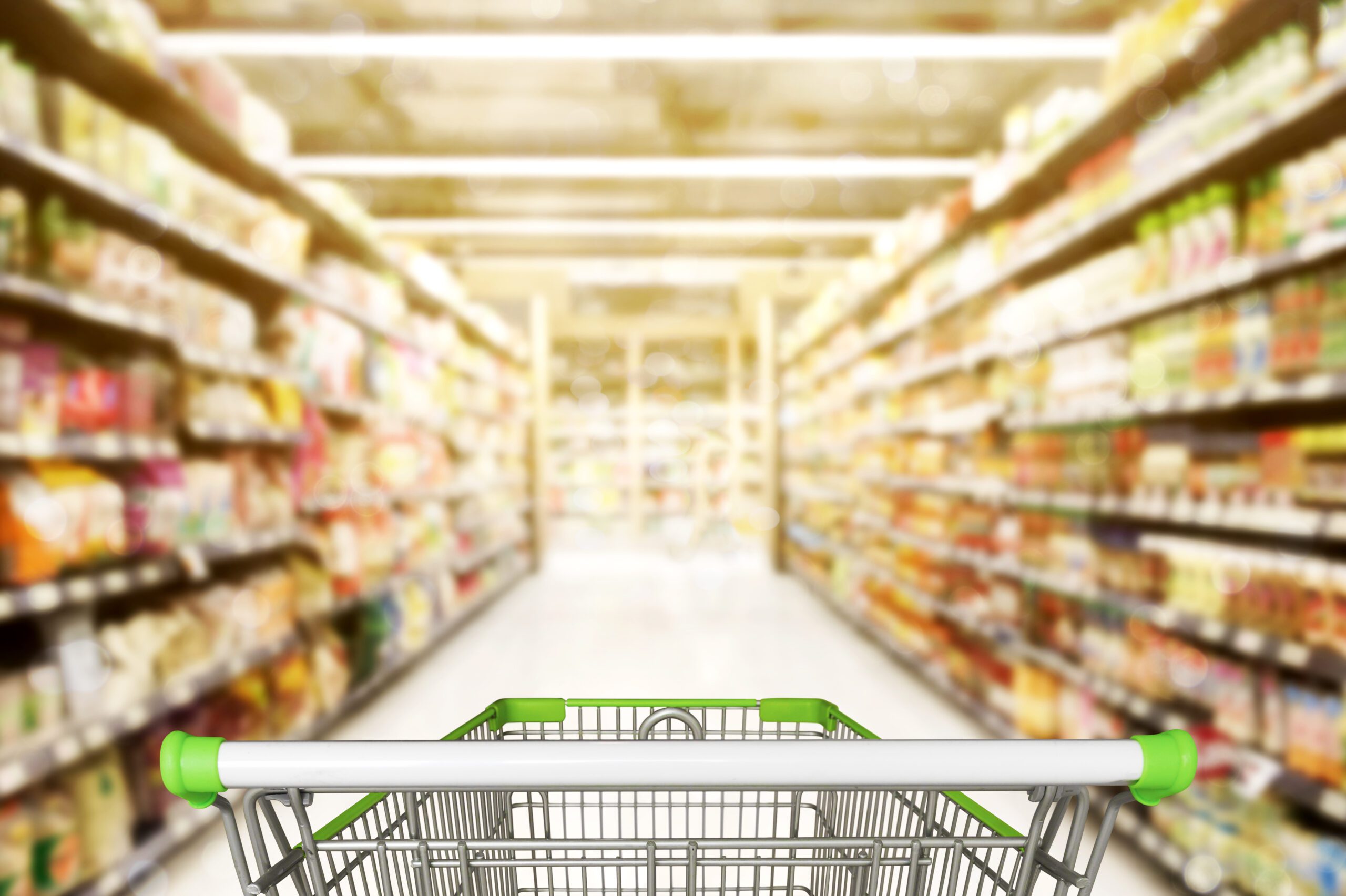 Abstract blurred photo of store with trolley in department store