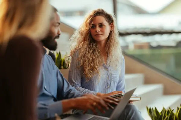 Professionals discussing ideas during a business meeting
